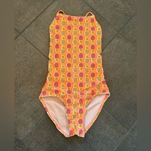 Girl’s Tea Collection Pineapple Print One Piece Cross-back Swimsuit in Size 10